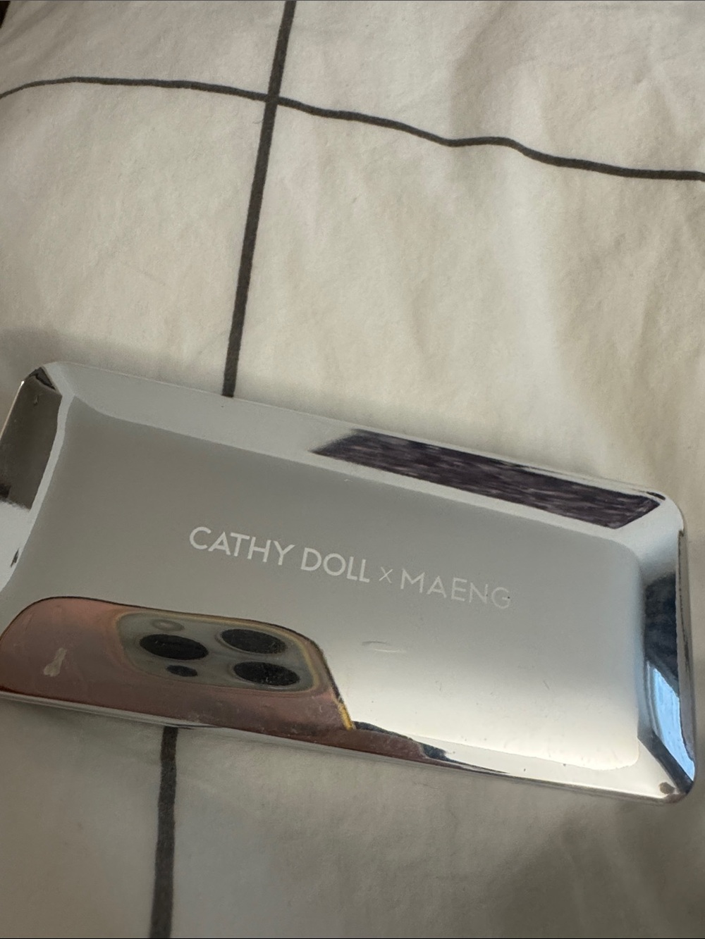 Cathy Doll x Maeng Reflective Silver Phone Case